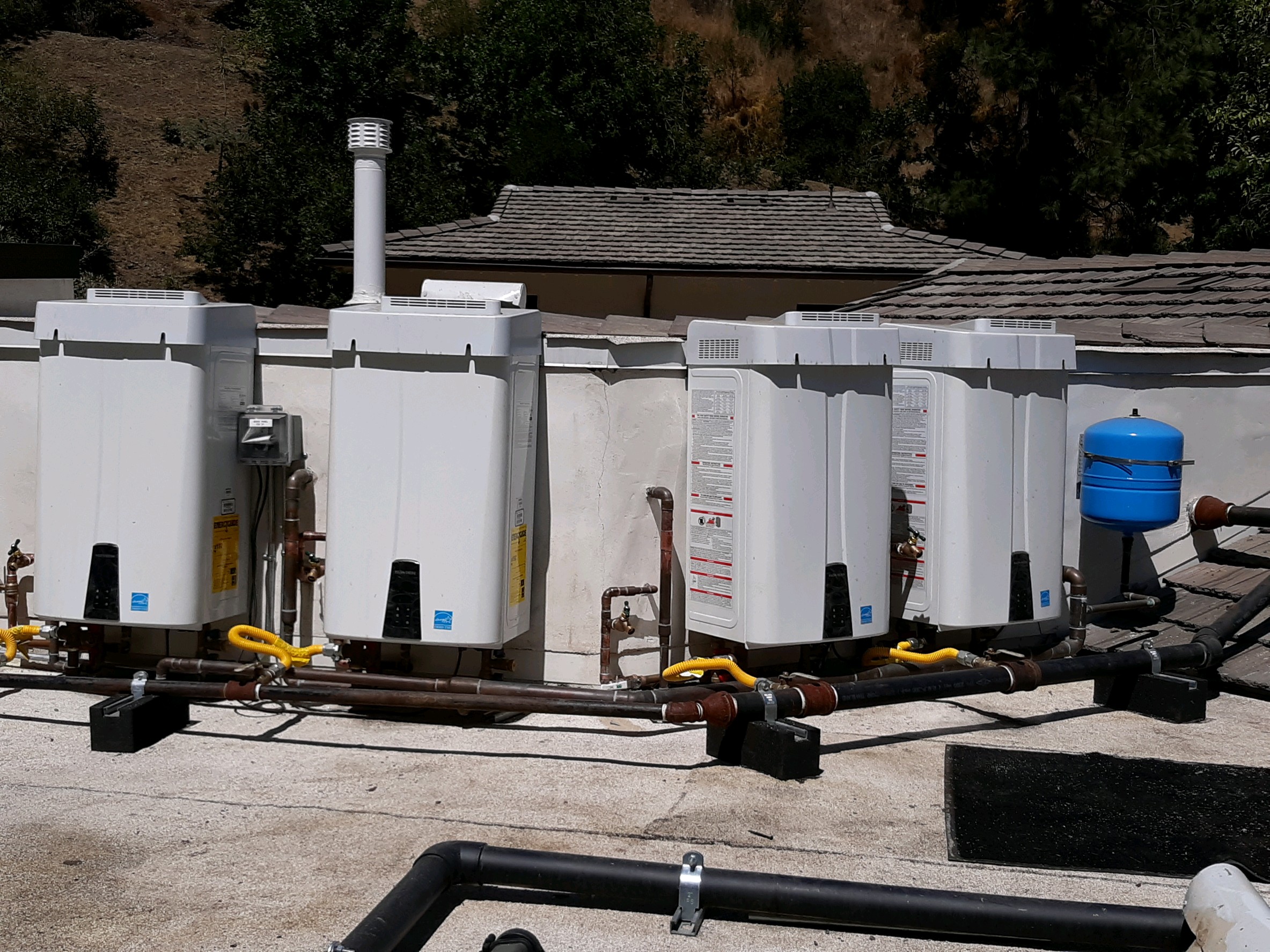 Commercial Tankless Water Heater by Rooter and Beyond Plumbing Los Angeles